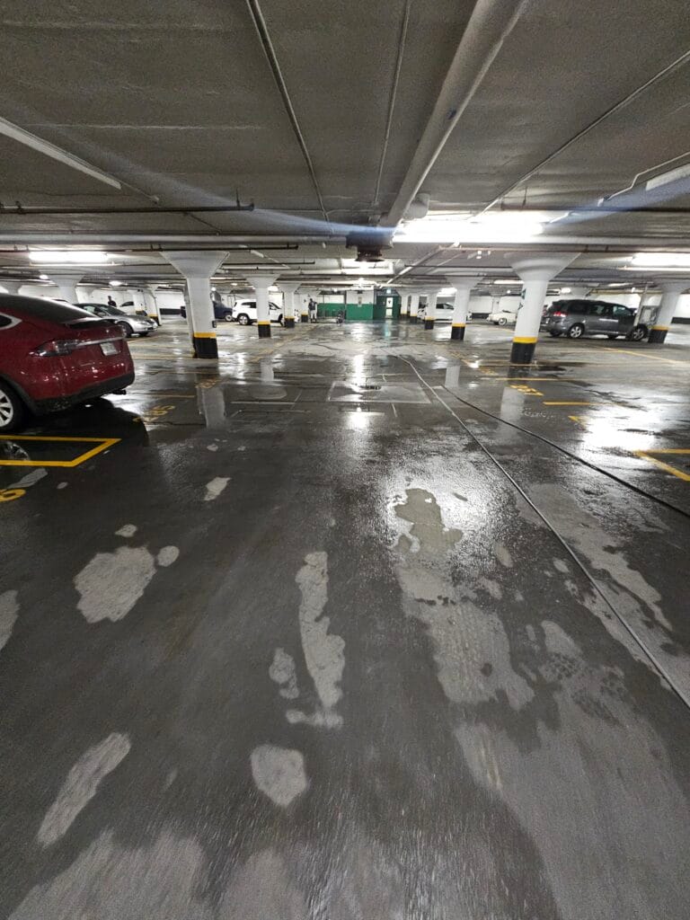 Wet floor of an underground parking garage